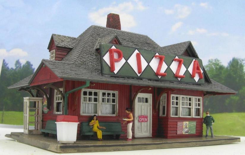 model train pizza restaurant building